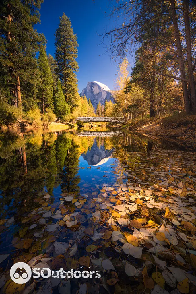 Yosemite Valley Merced river with reflection of Half-Dome and autumn colored trees, Yosemite National Park, California