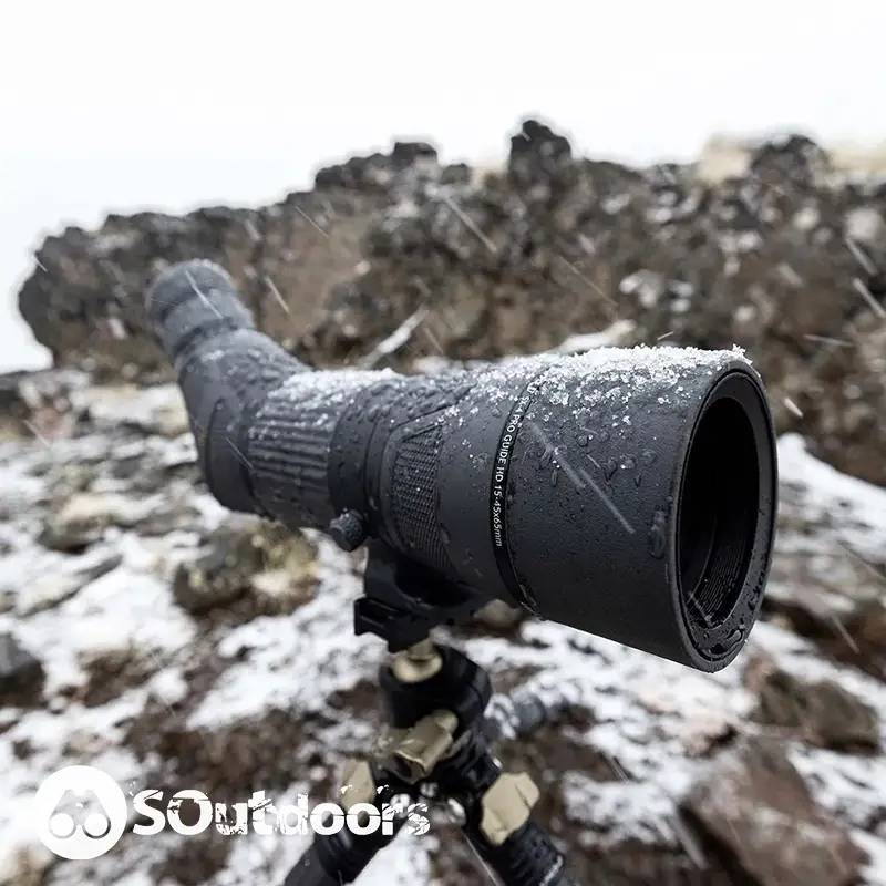 Spotting scope on a tripod tested for its waterproofing capabilities