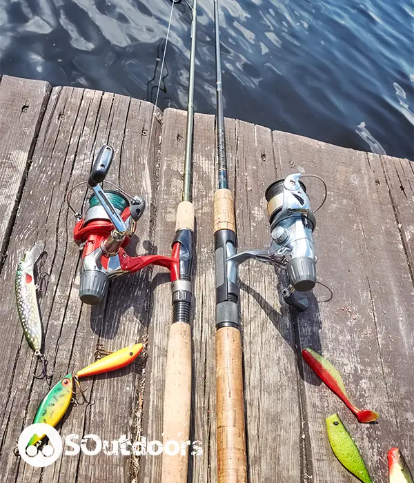 Two fishing rods with fake lures and baits