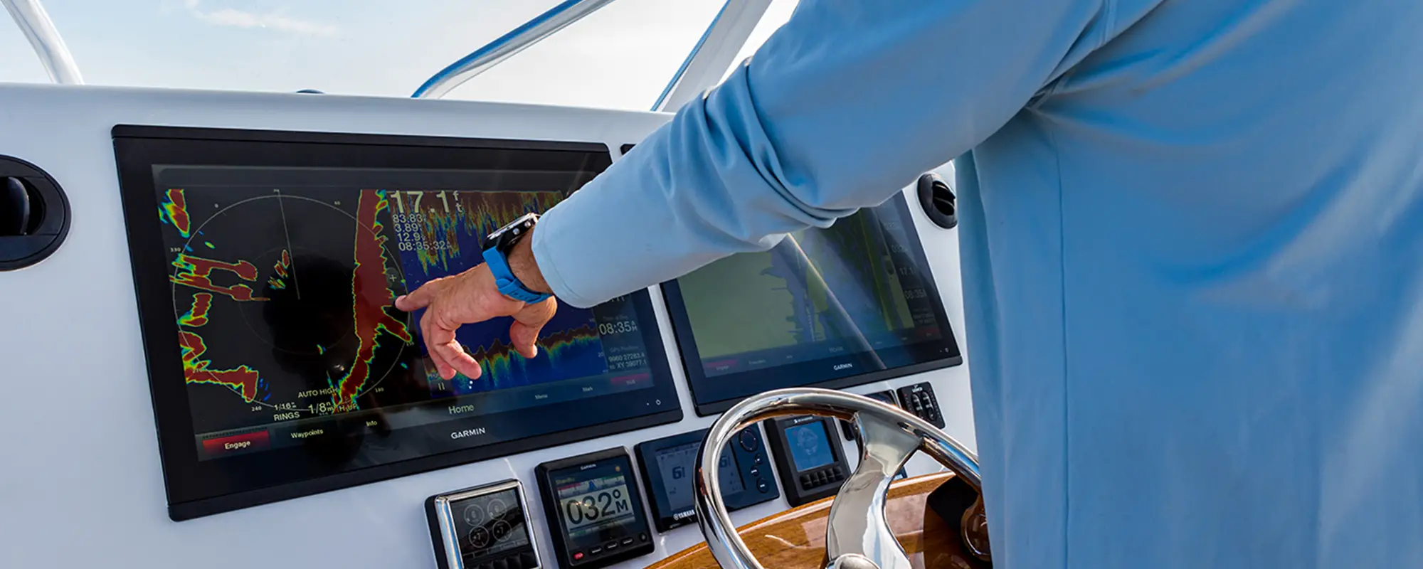 Screen of fish finder inside a luxury boat